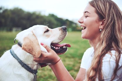 woman with dog outside